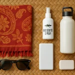 Essential items to pack for a Bali trip including sarong, mosquito spray, and reusable bottle.